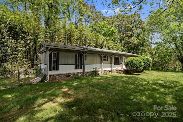 1 Ola Dr, Candler, NC 28715 - ranch-style house with a front lawn