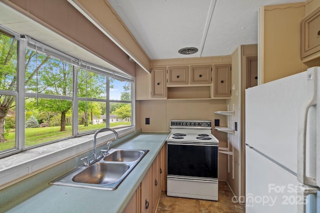 1 Ola Dr, Candler, NC 28715 - kitchen with white appliances, a sink, and light countertops