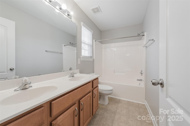 10008 King George Ln, Waxhaw, NC 28173 - bathroom featuring toilet, double vanity, shower / tub combination, and tile patterned floors