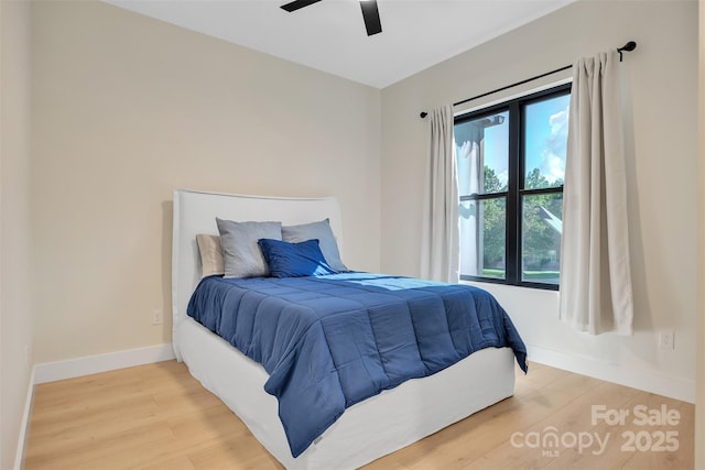 1141 Harper Lee Dr, Newton, NC 28658 - bedroom featuring light wood-type flooring and a ceiling fan