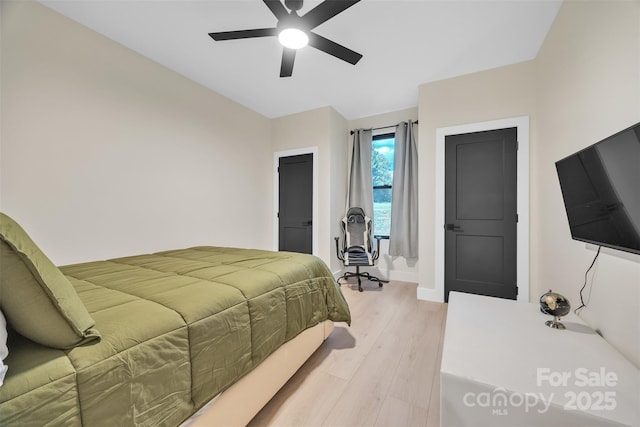 1141 Harper Lee Dr, Newton, NC 28658 - bedroom featuring light wood-style floors and a ceiling fan