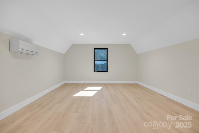1141 Harper Lee Dr, Newton, NC 28658 - bonus room with an AC wall unit, light wood-style floors, lofted ceiling, and recessed lighting
