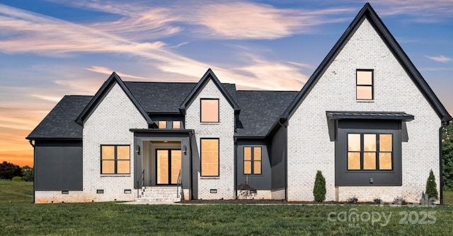 1141 Harper Lee Dr, Newton, NC 28658 - view of front of house with crawl space, brick siding, a yard, and a shingled roof