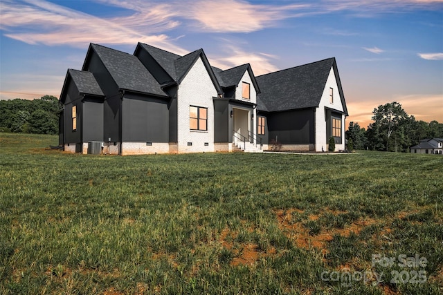 1141 Harper Lee Dr, Newton, NC 28658 - view of front of property featuring crawl space, a shingled roof, and a lawn