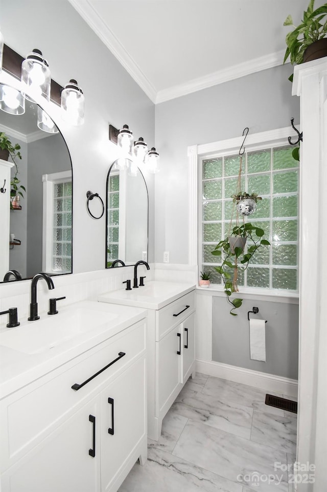 7328 S Providence Rd, Waxhaw, NC 28173 - bathroom with crown molding, marble look tiles, and two vanities