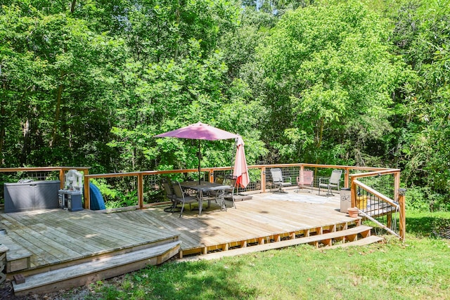 7328 S Providence Rd, Waxhaw, NC 28173 - deck featuring outdoor dining area, a wooded view, and a lawn