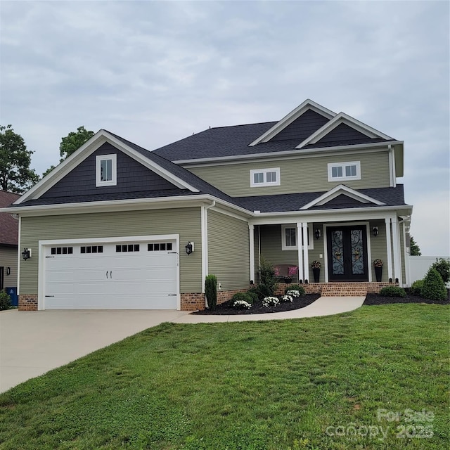 5118 Regents Park Dr, Hickory, NC 28602 - craftsman-style home with driveway, a front lawn, a garage, roof with shingles, and french doors
