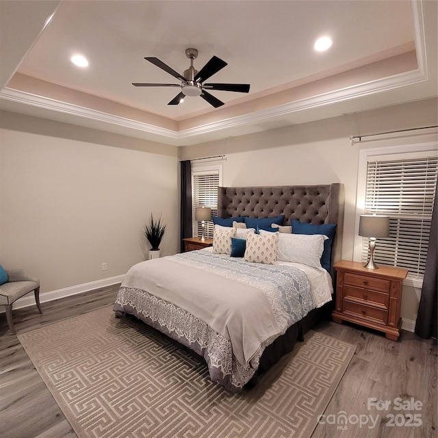 5118 Regents Park Dr, Hickory, NC 28602 - bedroom with a tray ceiling, wood finished floors, recessed lighting, and baseboards