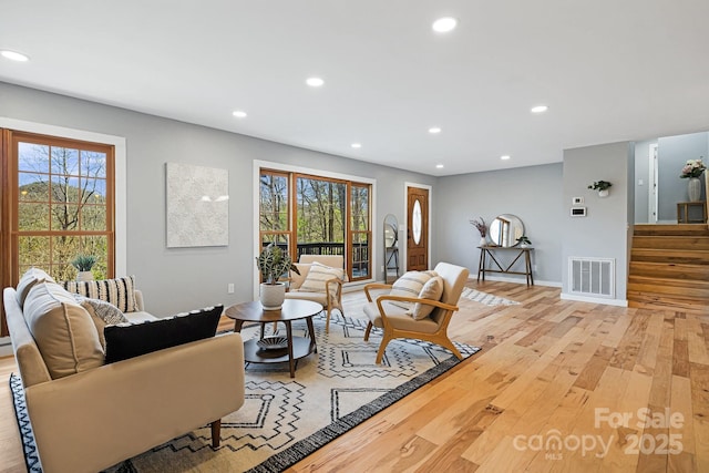 32 Whitaker View Rd, Fairview, NC 28730 - living area with light wood-style flooring, recessed lighting, stairway, plenty of natural light, and baseboards
