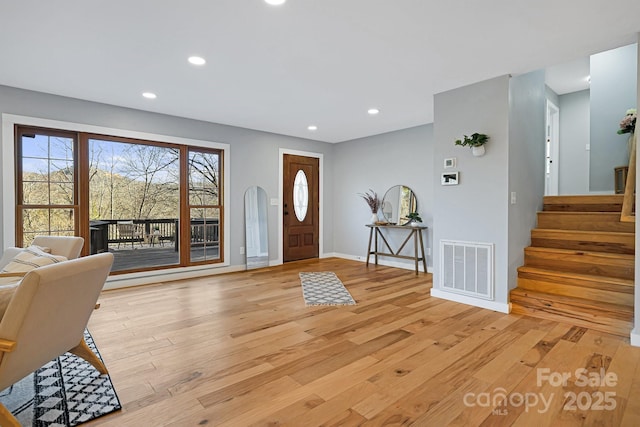 32 Whitaker View Rd, Fairview, NC 28730 - foyer entrance with light wood finished floors, stairway, recessed lighting, and baseboards