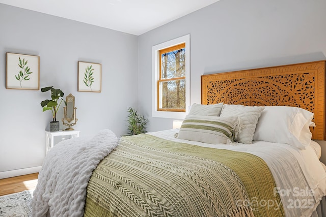32 Whitaker View Rd, Fairview, NC 28730 - bedroom with wood finished floors and baseboards
