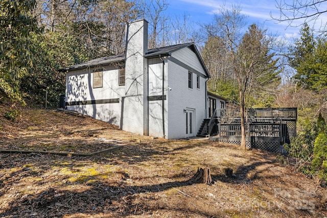 32 Whitaker View Rd, Fairview, NC 28730 - view of side of home with a chimney, a deck, and stairway