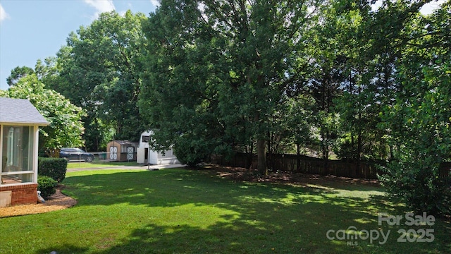 6003 Woodbridge Rd, Charlotte, NC 28227 - view of yard with an outdoor structure