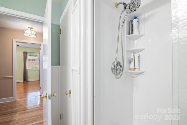 6003 Woodbridge Rd, Charlotte, NC 28227 - bathroom view of wood finished floors and a shower