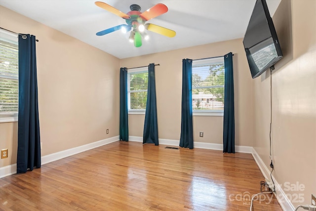 6003 Woodbridge Rd, Charlotte, NC 28227 - unfurnished room with ceiling fan and light wood-type flooring