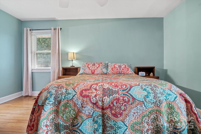 6003 Woodbridge Rd, Charlotte, NC 28227 - bedroom with wood finished floors and a ceiling fan