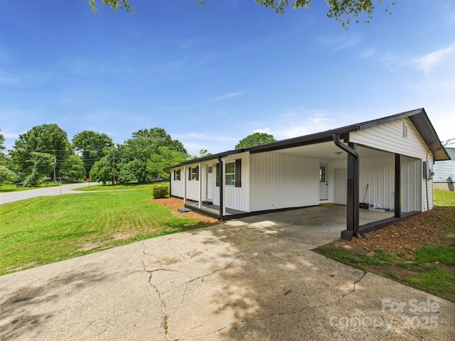 120 Hepler Rd, Taylorsville, NC 28681 - view of side of property with driveway, a yard, and an attached carport