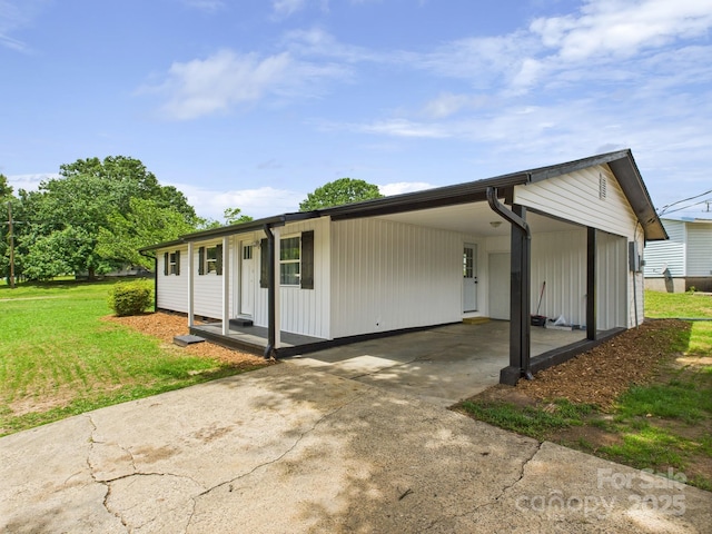 120 Hepler Rd, Taylorsville, NC 28681 - view of front of home featuring a front lawn, concrete driveway, and a carport