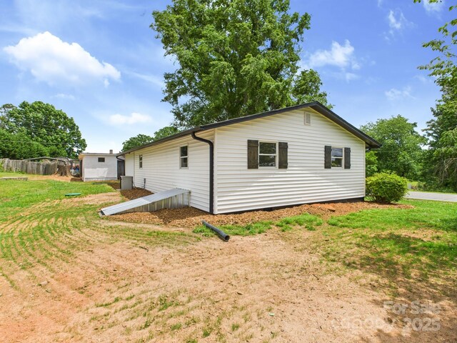 120 Hepler Rd, Taylorsville, NC 28681 - view of home's exterior with a yard