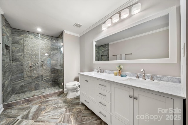 bathroom featuring toilet, ornamental molding, a stall shower, marble finish flooring, and double vanity