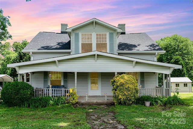6362 Sherrills Ford Rd, Catawba, NC 28609 - view of front facade with a chimney, covered porch, and a shingled roof