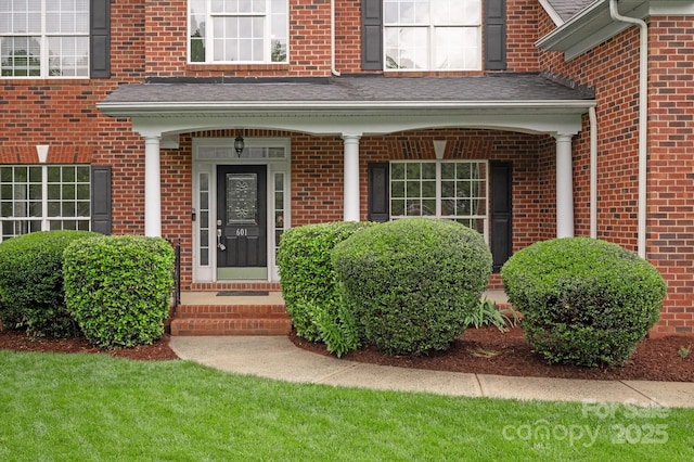 601 Carver Pond Ln, Waxhaw, NC 28173 - doorway to property with brick siding