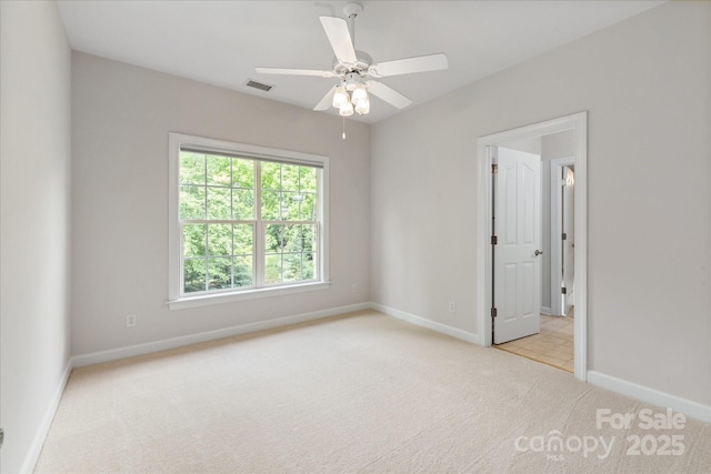 601 Carver Pond Ln, Waxhaw, NC 28173 - carpeted spare room featuring baseboards and a ceiling fan