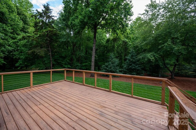 601 Carver Pond Ln, Waxhaw, NC 28173 - wooden deck featuring a yard