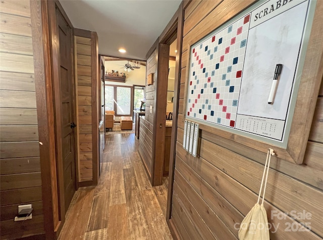 150 Easy St, Hot Springs, NC 28743 - hallway featuring wood finished floors, wooden walls, and recessed lighting
