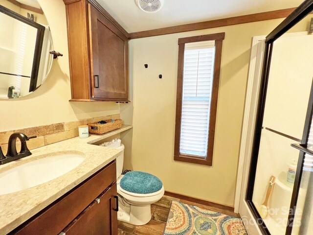 150 Easy St, Hot Springs, NC 28743 - full bathroom with a stall shower, vanity, wood finished floors, toilet, and baseboards
