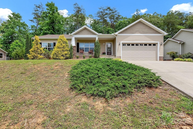 single story home featuring an attached garage, driveway, and a porch