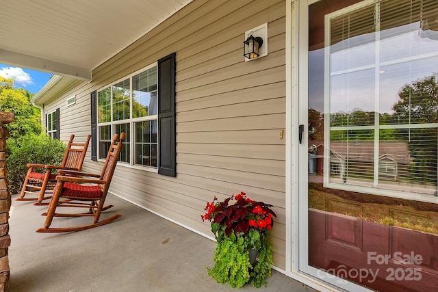 view of patio featuring covered porch
