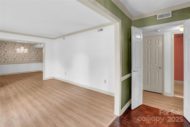 4738 Truscott Rd, Charlotte, NC 28226 - spare room featuring a chandelier, baseboards, crown molding, and wood finished floors