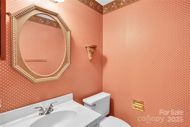 4738 Truscott Rd, Charlotte, NC 28226 - half bath featuring wallpapered walls, toilet, and vanity