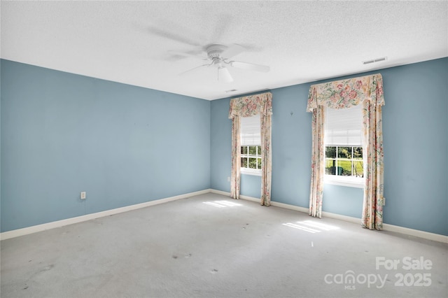 4738 Truscott Rd, Charlotte, NC 28226 - empty room featuring a textured ceiling, a ceiling fan, baseboards, and carpet flooring