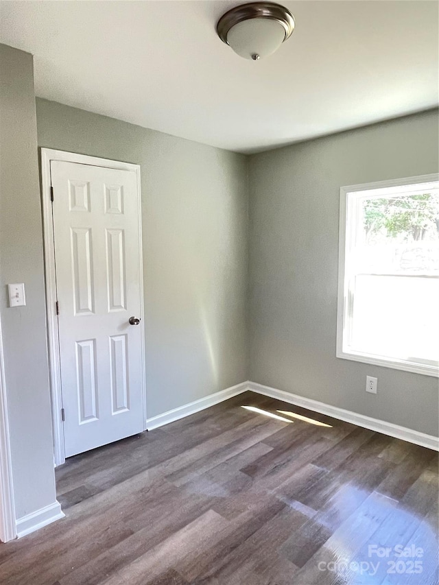 1052 S Grove Street Ext, Lincolnton, NC 28092 - unfurnished room featuring wood finished floors and baseboards