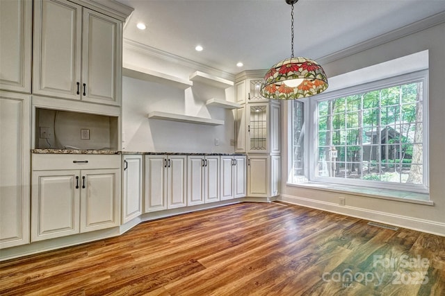46 Timberidge Dr, Lake Wylie, SC 29710 - kitchen featuring ornamental molding, light wood finished floors, open shelves, pendant lighting, and dark stone countertops