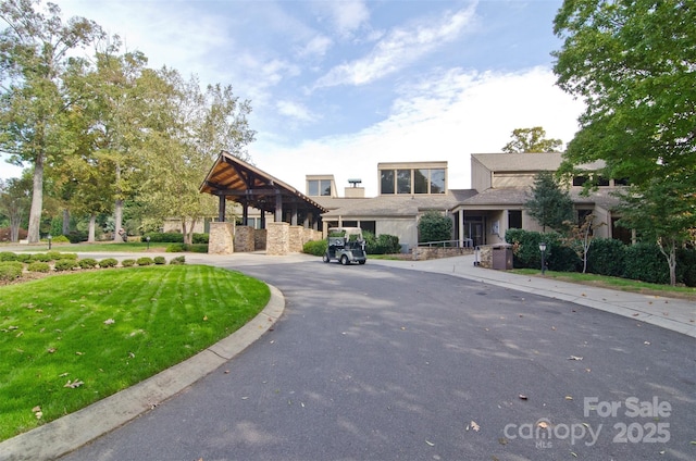 46 Timberidge Dr, Lake Wylie, SC 29710 - contemporary home featuring stone siding and a front yard