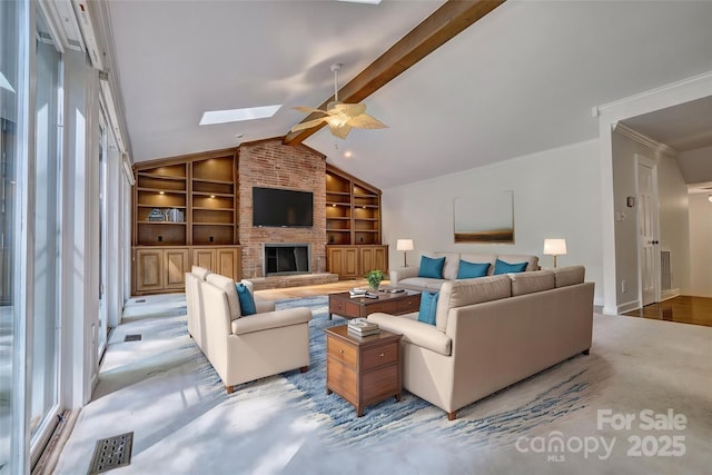 46 Timberidge Dr, Lake Wylie, SC 29710 - living area featuring built in features, a skylight, a ceiling fan, baseboards, and a fireplace