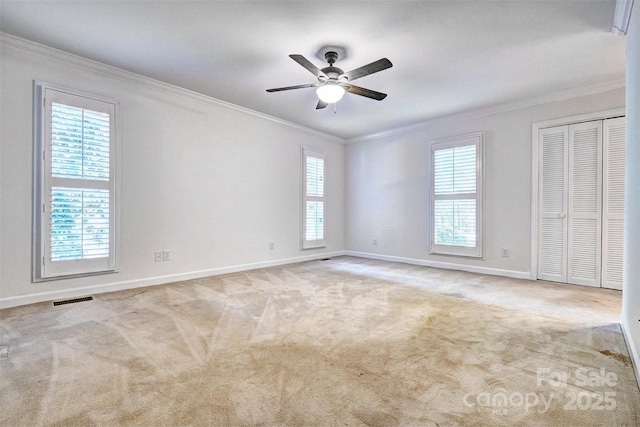 46 Timberidge Dr, Lake Wylie, SC 29710 - carpeted empty room with crown molding, baseboards, and ceiling fan