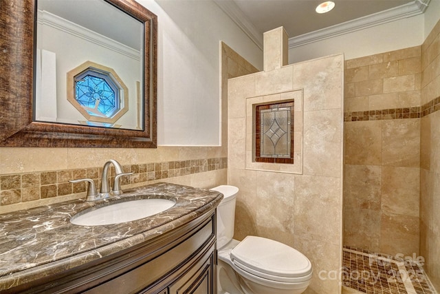 46 Timberidge Dr, Lake Wylie, SC 29710 - full bathroom featuring ornamental molding, toilet, a tile shower, vanity, and tile walls