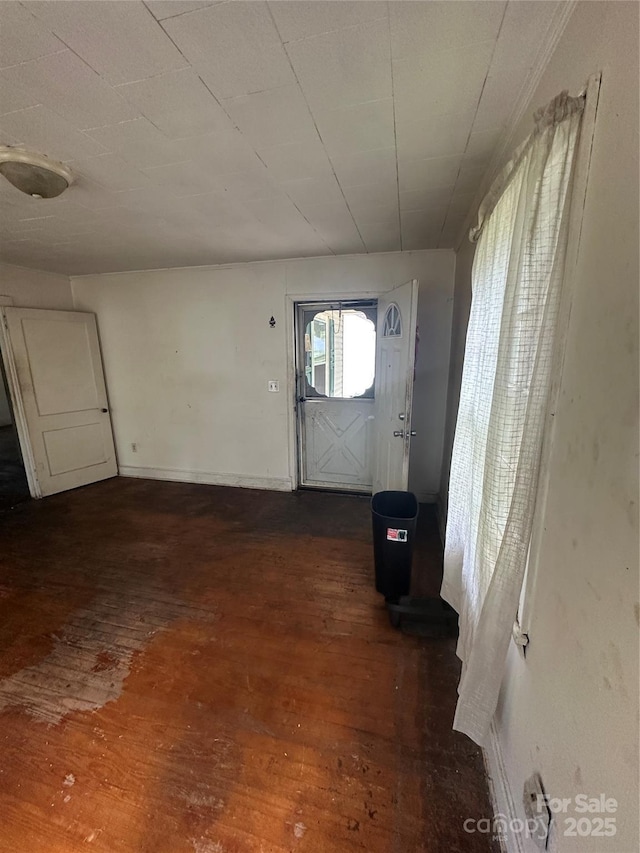 hallway with dark wood-type flooring