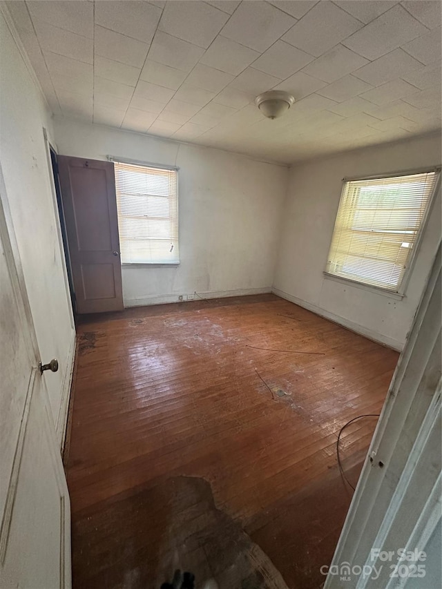 empty room featuring hardwood / wood-style floors