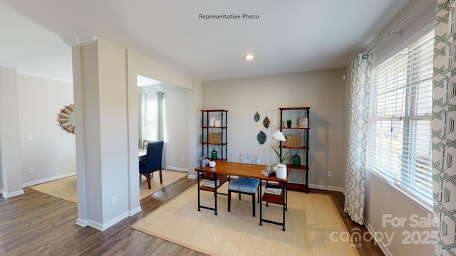 office featuring wood finished floors, baseboards, and recessed lighting