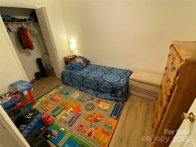 5309 Lewis Rd, Gastonia, NC 28052 - bedroom featuring wood finished floors and a closet