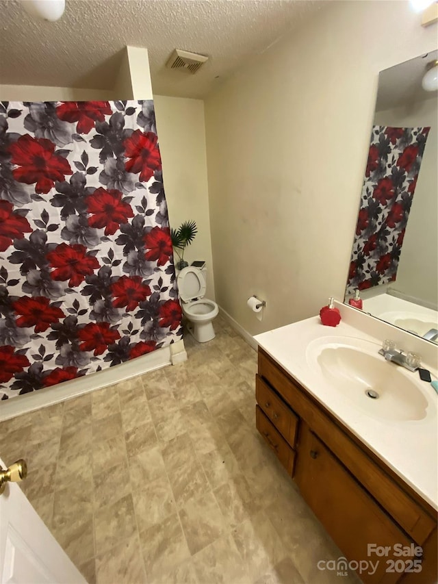 5309 Lewis Rd, Gastonia, NC 28052 - bathroom featuring vanity, a textured ceiling, tile patterned floors, and a shower with shower curtain