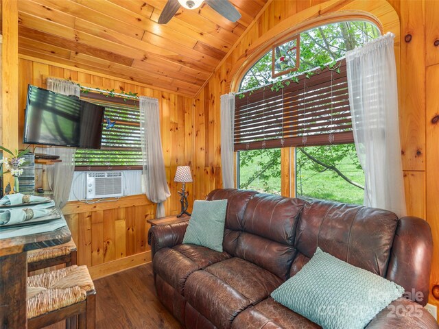 10 Gardening Frog Trl, Waynesville, NC 28785 - living area featuring vaulted ceiling, cooling unit, ceiling fan, wood finished floors, and wood walls