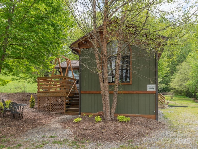 10 Gardening Frog Trl, Waynesville, NC 28785 - view of home's exterior featuring stairway and a wooden deck