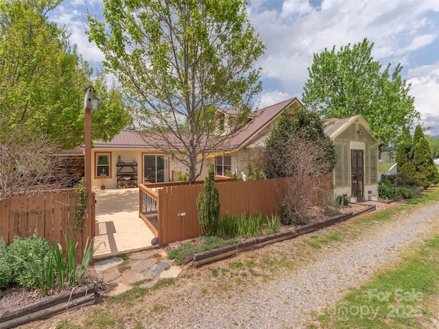 10 Gardening Frog Trl, Waynesville, NC 28785 - view of front of home with a wooden deck and metal roof
