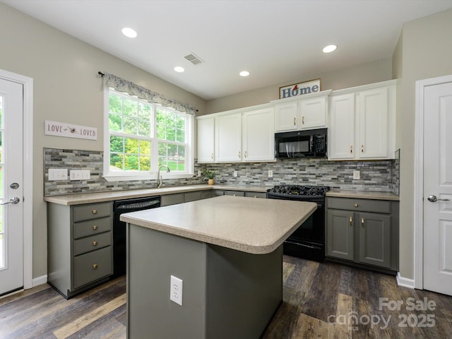 3224 Dunbar Ln, Fort Mill, SC 29707 - kitchen with black appliances, gray cabinets, light countertops, dark wood-type flooring, and recessed lighting
